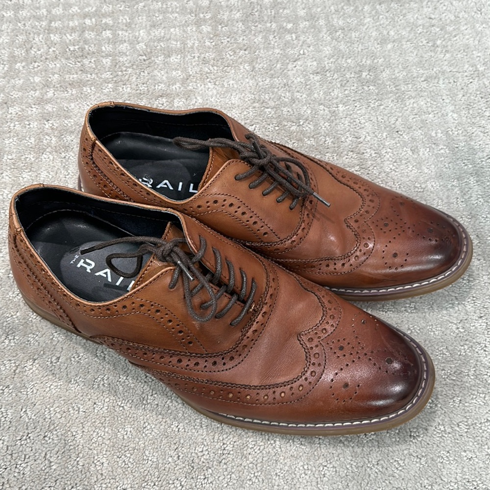 Brown leather dress shoes wingtip
